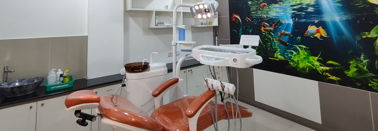 Patient smiling in the Apollo Dental Jayanagar treatment room